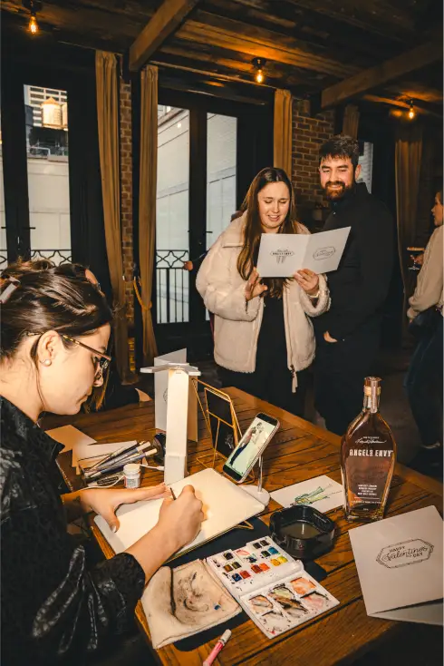 Individuals exploring an Angel’s Envy event menu
